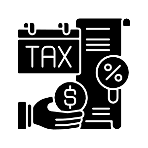Hand holding money with tax documents and percentage symbol.